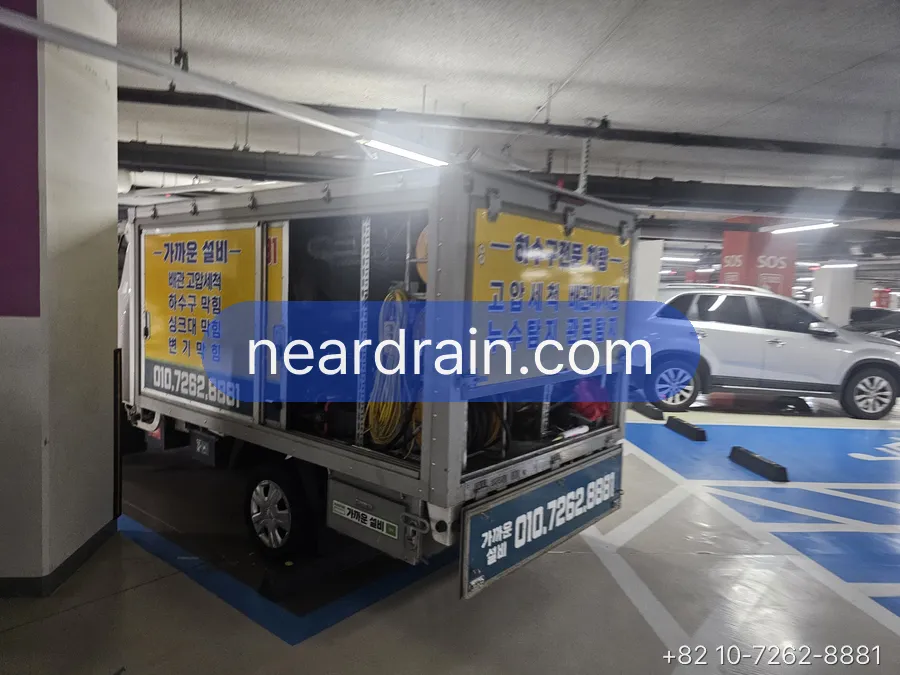 Our truck parked for a job in an underground garage